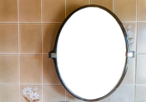 Empty blank plastic mirror hanging on the wall in the bathroom with retro til Stock Photos