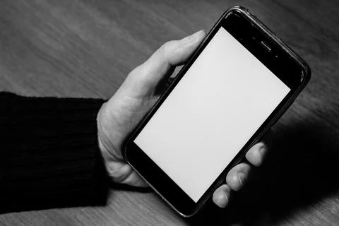 Empty, blank, white screen smartphone with copy space for design or text. Gadget Stock Photos