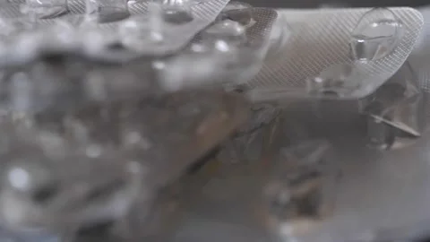 Empty blisters in a pile rotating, close-up. Stock Footage 304248264