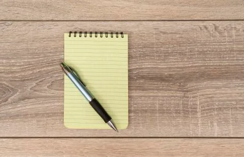 An empty block and a pen Stock Photos