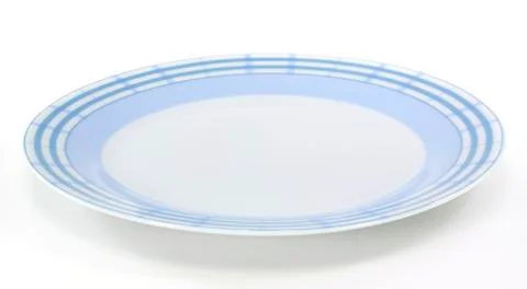 Empty blue and white plate on white background Stock Photos
