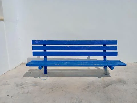 Empty Blue bench on white background in Santorini Greece Stock Photos
