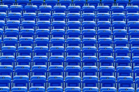 Empty blue bleachers Foto stock