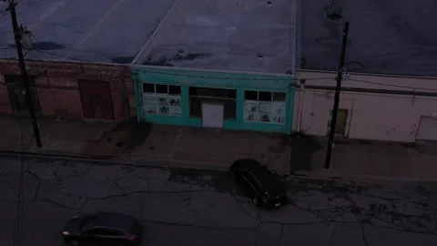 Empty Blue Brick Warehouse, Boarded Up, Bryan, Texas, USA Stock Footage 142110679