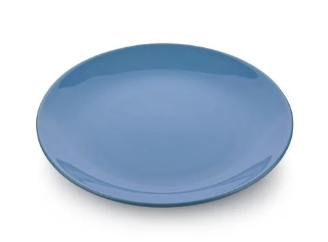 Empty blue ceramic plate on white background. Stock-Fotos