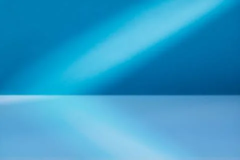 Empty blue paper background with light rays Stock Photos