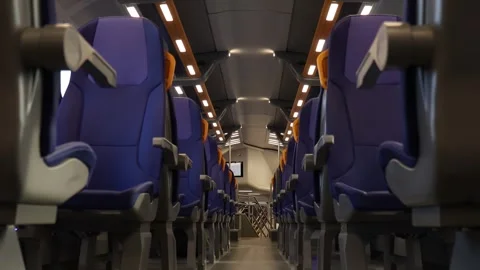 Empty blue passenger seats with yellow handles inside modern train carriage Stock Footage 345446837