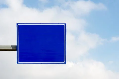 Empty blue road sign Stock Photos