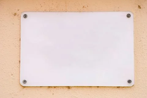 Empty board on the wall Stock Photos