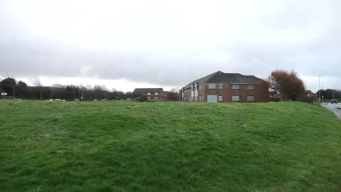 Empty boarded old peoples home, police car parked up Stock Footage 260503244
