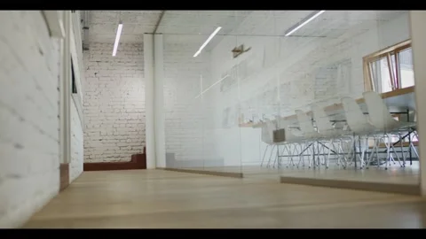 Empty Boardroom With Exposed Brick Wall, Wooden Floor Interior, Panning Shot Stock Footage 340298803