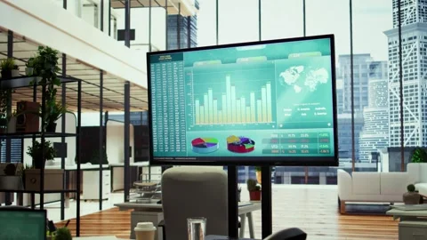Empty boardroom setup with a computer displaying financial data Stock Footage 318226154