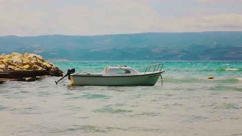 Empty boat on Adriatic Sea in Omis Croatia Stock Footage