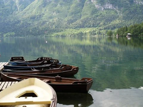 Empty boat on water Stock Photos