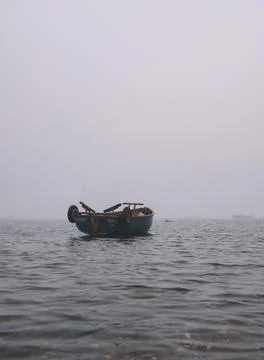 Empty boat on the water Stock Photos