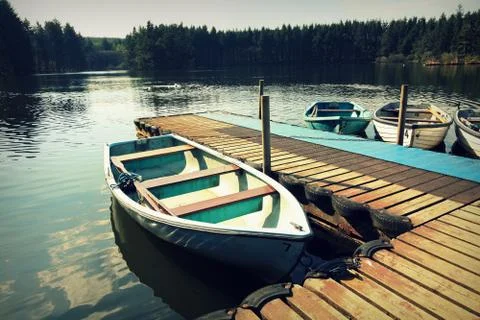 Empty boats on the lake Stock Photos