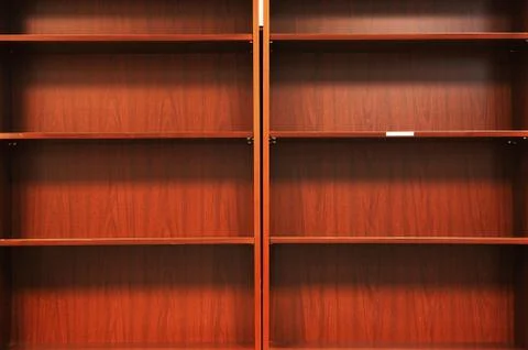 Empty bookshelf background Stock Photos