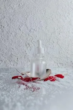An empty bottle with a broken New Year's toy Stock Photos