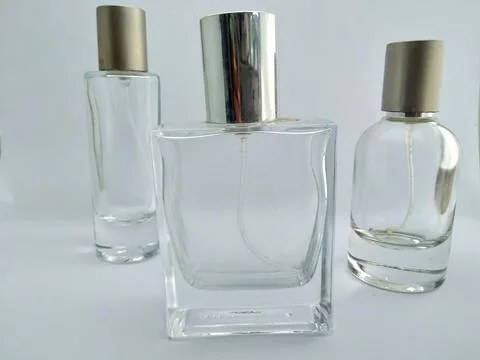 Empty bottle perfume with white background Stock Photos