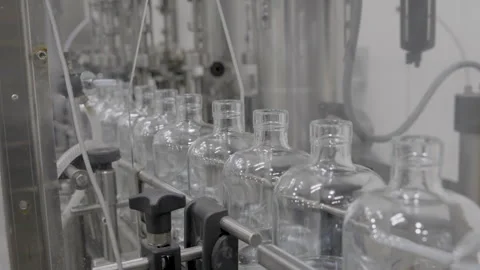 Empty Bottles on Belt Stock Footage 260262618