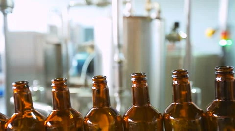 Empty bottles on the conveyor Stock Footage 64770480