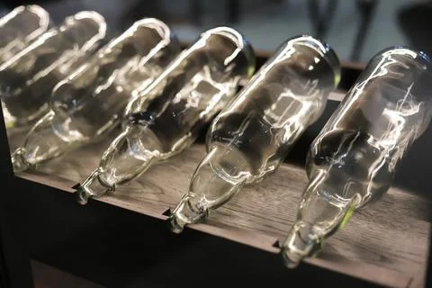 .Empty bottles on the shelf in the interior Stock-Fotos