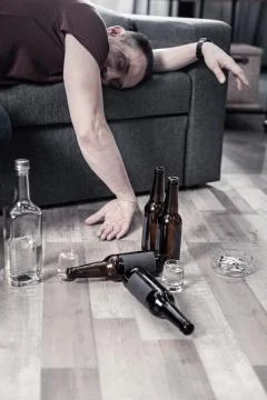 Empty bottles standing on the floor Stock Photos