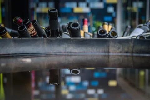 Empty bottles of vine close view top stacked Stock Photos