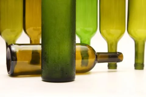 Empty bottles of wine on white background Stock Photos