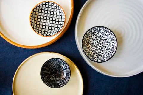 Empty bowls and plates on the table, dishware and tableware Stock Photos