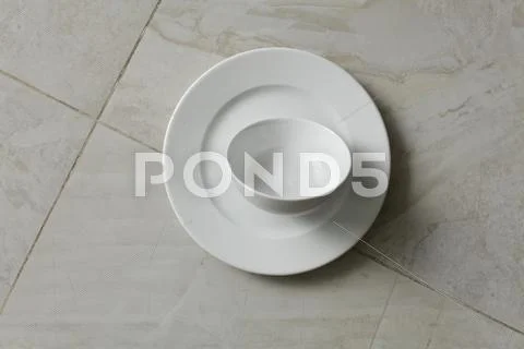 Empty Bowls, Plates And Cups On Gray Background