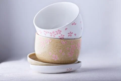Empty bowls on a white background Stock Photos