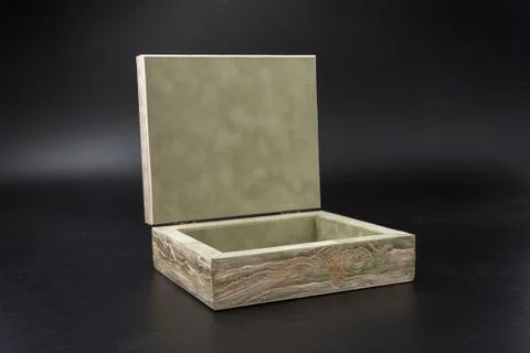 An empty box on a black background. casket. Stock Photos