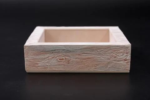 An empty box on a black background. casket. 스톡 사진