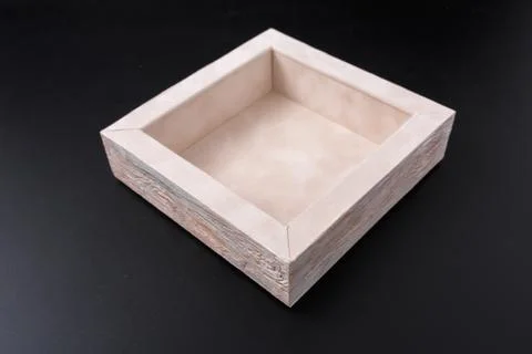 An empty box on a black background. casket. Stock Photos