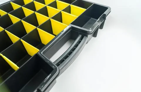 Empty box with cells for storing small parts and fasteners. Sectional tool box Stock Photos