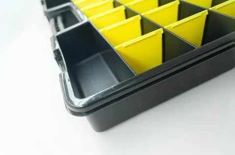 Empty box with cells for storing small parts and fasteners. Sectional tool box Stock Photos