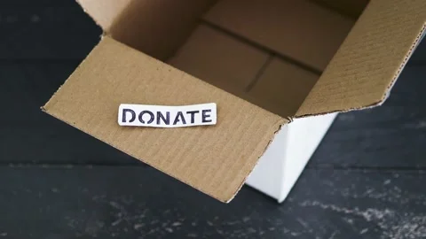 Empty box with Donate label for second-hand items to be given away, charity d Video stock 148127638
