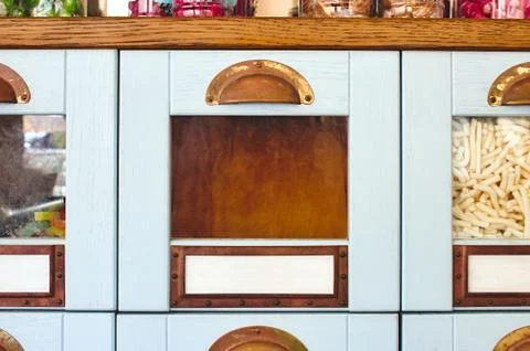 Empty box drawer with glass front in a display cabinet in a sweet shop - prod Stock Photos