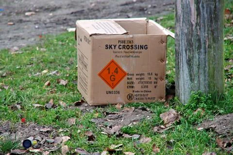 Empty box of fireworks left as garbage on the Street Stock Photos