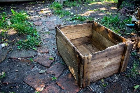 The empty box on the ground in the backyard Stock Photos