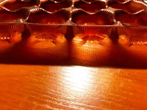 An empty box of sweets on the table. Stock Photos