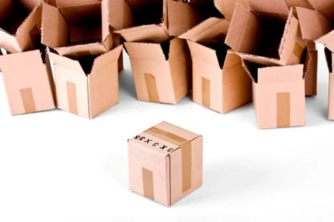 Empty boxes behind one closed box in front Foto stock