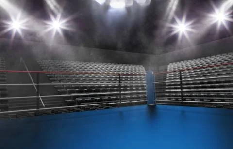 Empty boxing ring in arena, spot lights, smoke and dark night scene Stock Photos