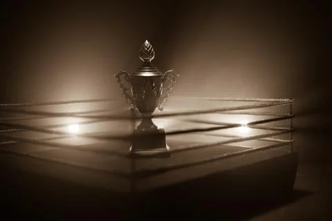 Empty boxing ring with red ropes for match in the stadium arena. Creative art Photos