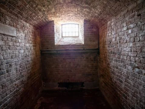 Empty Brick Cellar With Arched Ceiling And Window Stock Photos
