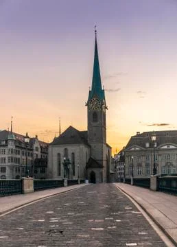 Empty Bridge on the the Limmat and the deserted old town of Zurich during the Stock Photos
