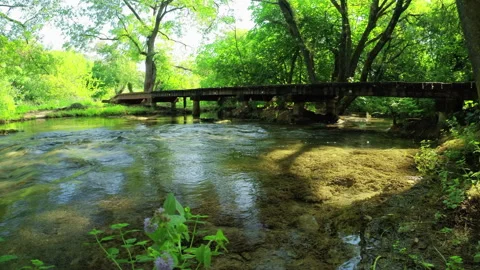 Empty bridge over the water stream in Krka National Park, Croatia - 4K, Ultra Stock Footage 240133710
