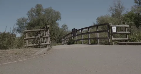 Empty bridge with social distancing sign Stock Footage 136541383