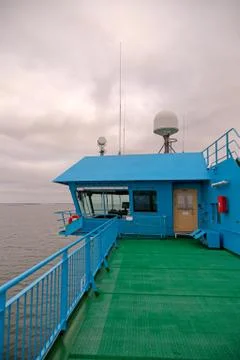 Empty Bridge Wing of a car ferry on a moody day at sea between Stockholm and Stock Photos